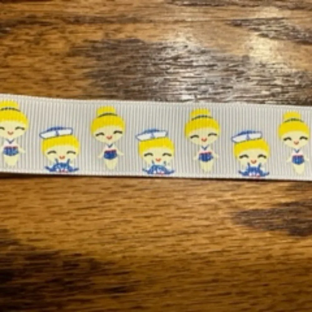White Grosgrain Ribbon with Blonde Girl and Ship Wheel  ****ALL RIBBONS BUY 2 GE